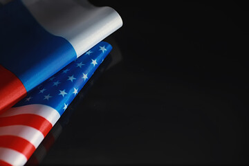 The concept of diplomatic relations. Flag of the United States of America and the Russian...