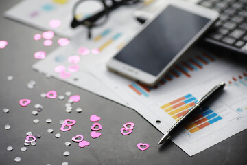 Working time symbolizes the desktop. Office desk with papers from an insurance manager and banker. Office worker at the table. The concept of lack of time.