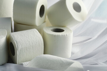 Toilet paper in a roll. Snow-white soft three-layer toilet paper. Lack of hygiene products. Primary protection and disinfection.