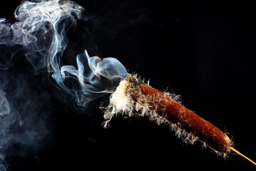 Reed smoke isolated on black