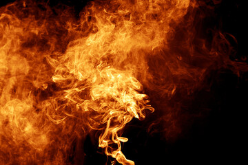 Gold smoke isolated on black background.