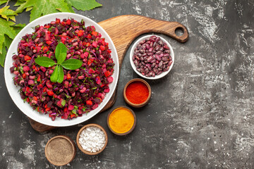 top view vinaigrette salad with beet and beans on a grey background food salad diet