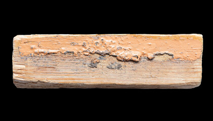 Wooden beam isolated on a black