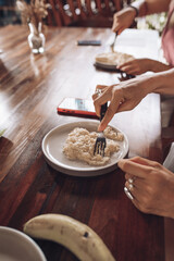 Girls bake oatmeal cookies at home