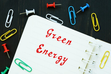 Business concept meaning Green Energy with inscription on the piece of paper.