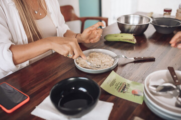 Girls bake oatmeal cookies at home