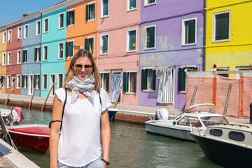 Venice landmark, Burano island canal, colorful houses and boats - 400506728