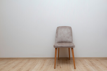 front view, chair standing on wooden parquet