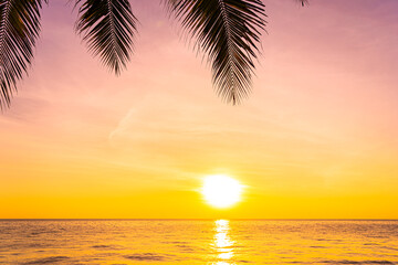 Beautiful landscape of sea ocean with silhouette coconut palm tree