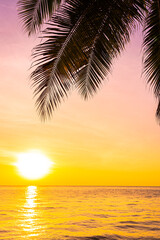 Naklejka na ściany i meble Beautiful landscape of sea ocean with silhouette coconut palm tree