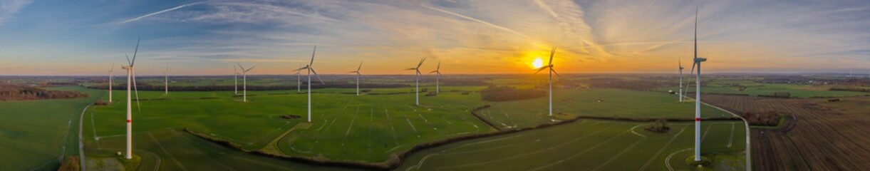 Fototapeta na wymiar Wind energy park at beautiful sunset, Schleswig-Holstein, Germany.