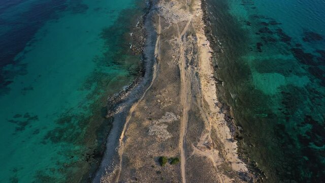 Aerial view of the sand spit and turquoise water of Formentera, Ibiza