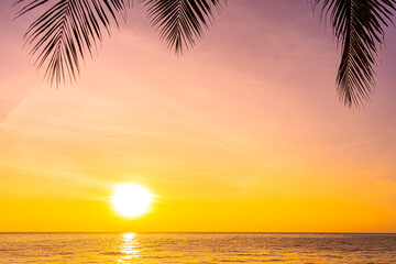 Naklejka na ściany i meble Beautiful landscape of sea ocean with silhouette coconut palm tree