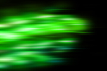 abstract led light trails defocused on black background, motion blur