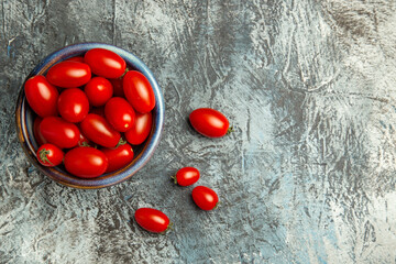 top view fresh red tomatoes inside plate on dark-light background fruits photo dark salad