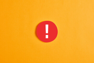 Red round circle with an exclamation mark button