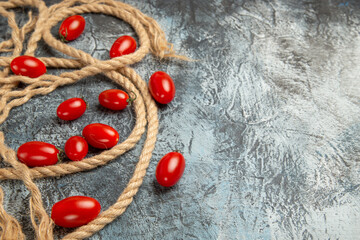 front view cherry tomatoes with ropes on light background food ripe photo salad free place