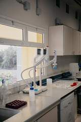 laboratory bench with equipment to analyze and develop samples