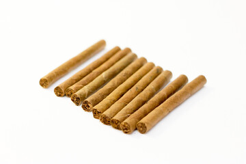 Natural cigarillo isolated on the white background