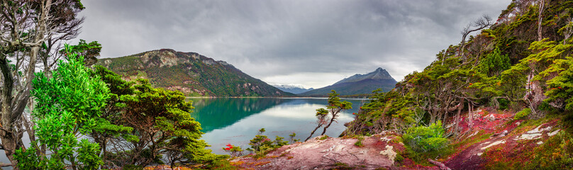 Naklejka na ściany i meble Panoramic view over beautiful and colorful landscape at Ensenada Zaratiegui Bay in Tierra del Fuego National Park, near Ushuaia and Beagle Channel, Patagonia, Argentina, early Autumn.