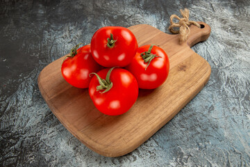 front view fresh red tomatoes on dark-light background ripe photo salad food