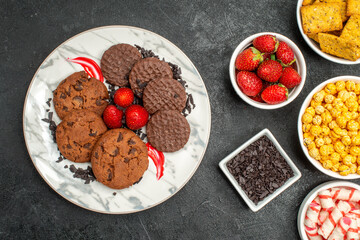 top view delicious choco biscuits with snacks on dark background sweet photo cookie