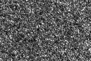 Gray gravel stones background. Gravel stones for the construction industry