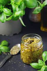 Homemade pesto in a glass jar