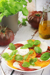 A plate with Italian salad caprese