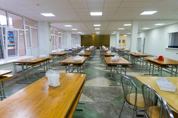 Chairs and tables. The dining hall in school is quarantined, isolation.