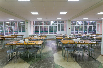 Chairs and tables. The dining hall in school is quarantined, isolation.