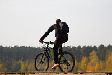 Young fit man during a bike ride