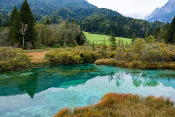 A beautiful mountain lake in the autumn national park of Slovenia.
