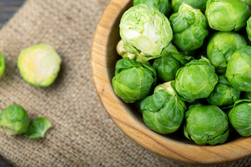 Brussels sprouts in a wooden bowl. Harvesting.