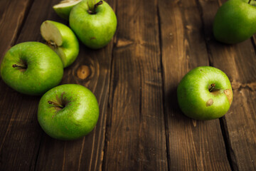 apples on brown wood table