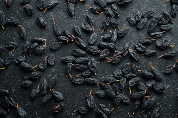 Dried fruits. Raisins made of blue grapes. Top view.