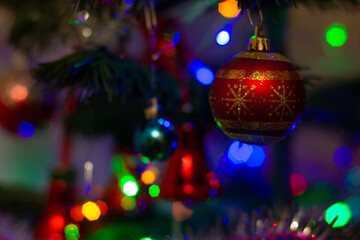 Fototapeta na wymiar Decorated Christmas tree in colorful lights