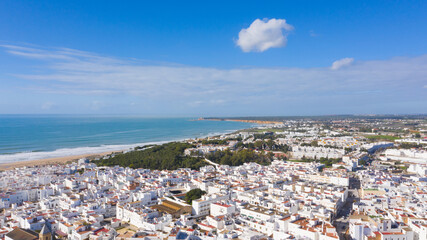 Aerial views of white town in the province of Cadiz, Andalusia. Conil de la frontera seen from above, in south Spain © Avril
