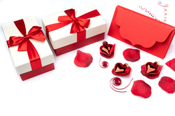 Red ribbon in the form of serpentine and red glass hearts.