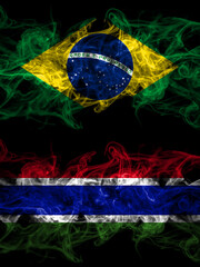 Brazil, Brazilian vs Gambia, Gambian smoky mystic flags placed side by side. Thick colored silky abstract smoke flags.