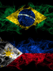 Brazil, Brazilian vs Philipines smoky mystic flags placed side by side. Thick colored silky abstract smoke flags.