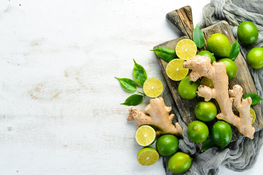 Fresh lime and ginger root. Vitamins. Top view. Free space for your text.