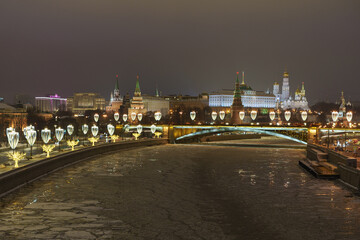 Fototapeta premium Photography of Moscow cityscape in night. View from above. Kremlin wall, Towers, Residence of President of the Russian Federation, Ivan the Great Bell Tower, Dormition Cathedral