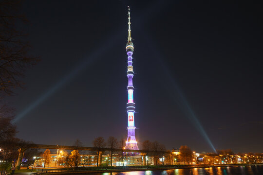 Moscow, Russia - November 9, 2020: Ostankino tv tower details in night autumn sky during coronavirus pandemic time. The high technology in everyday life. Long exposure image. High resolution in night