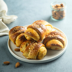 Homemade pumpkin buns with almond and jam