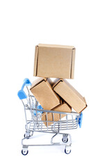 Shopping cart full of cardboard boxes, isolated on white background