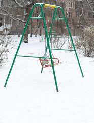 Baby swing in Russia while winter.