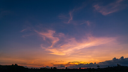 sunset over silhouette mountain countryside in the evening on twilight 