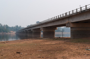 Obraz premium Road bridge over Nam Theun river near Thalang village, Thakhek, Laos 