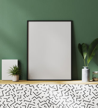 poster frame mockup with green wall and tropical leaves, 3d rendering